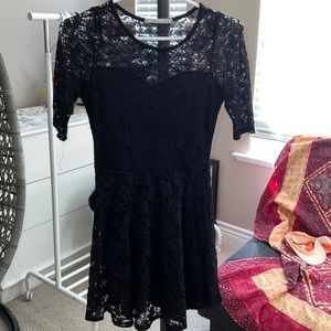 Rolla Coster black fit and flare lace dress with short sleeves